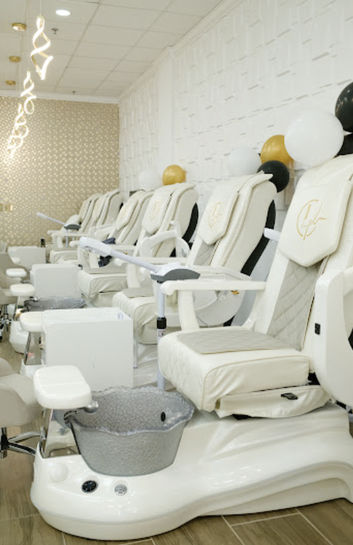 White leather pedicure spa chairs in the pedicure lounge